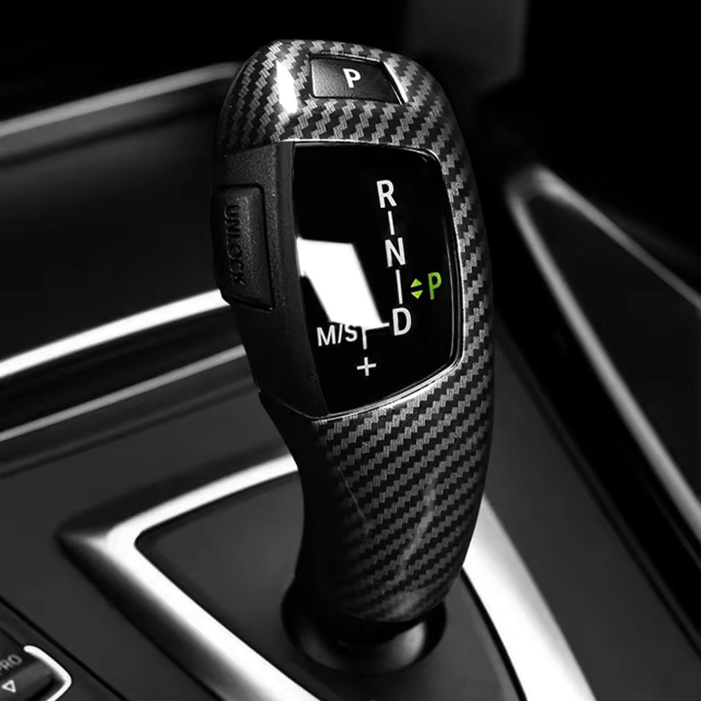 Garniture de pommeau de vitesse style carbone BMW