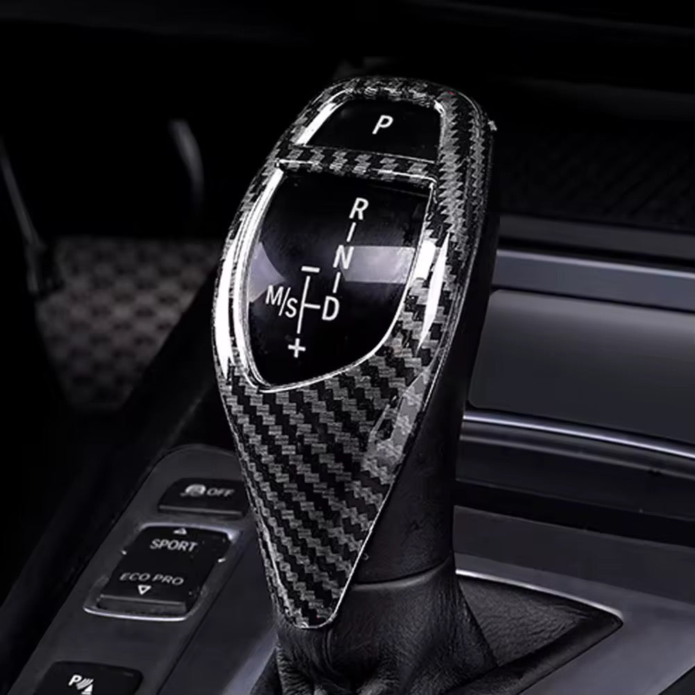 Garniture de pommeau de vitesse style carbone BMW