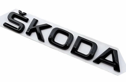 Emblème noir brillant « SKODA » / « FABIA »